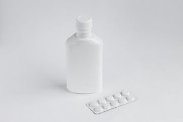 Mockup for the presentation of medicines, vitamins, tablets, capsules, pills, drugs, cough syrups.