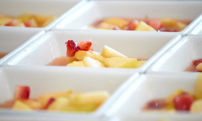 fruit slices on white ceramic plates