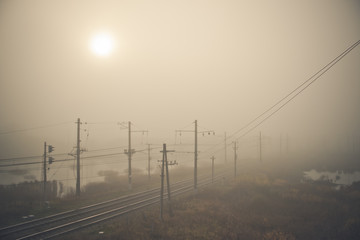 Fog on the railway. Foggy Russian railway. Morning fog.