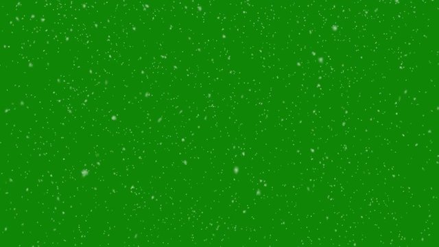 Isolated falling snow on green screen. 4K