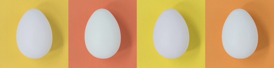 White Easter eggs on a pastel multi-color square background, banner