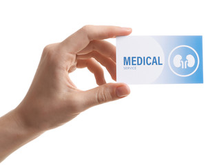 Fototapeta premium Woman holding medical business card isolated on white, closeup. Nephrology service