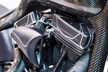 The powerful engine of a modern motorcycle closeup. The layout of the motor