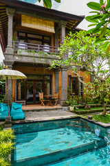 Garden on back yard with swimming pool