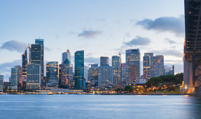 Fototapeta premium Panoramic view of Sydney skyline at dusk from Kirribilli