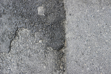 New and old asphalt surface patch city street pavement