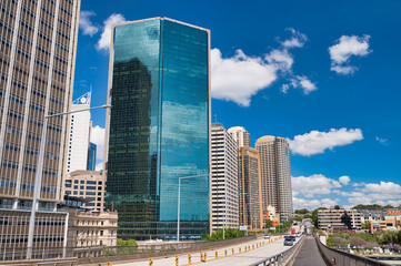 SYDNEY - OCTOBER 2015: Panoramic view of city skyscrapers. The city attracts 20 million people annually