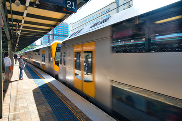SYDNEY - OCTOBER 2015: Subway train in the railway station. The city attracts 20 million people...