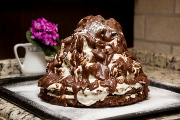 homemade cake volcano with chocolate icing