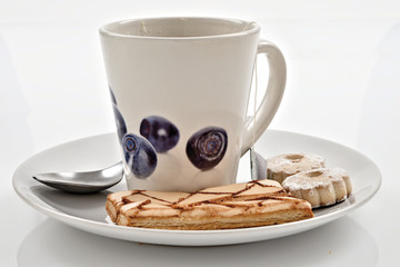 tè verde al limone con biscotti