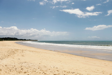 Beautiful tropical beach sea and sand on blue sky and white cloud for travel and vacation Porto Seguro - Brasil - Image