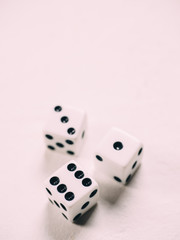 White classic dices on background. Board game