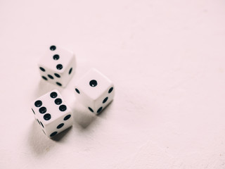 White classic dices on background. Board game