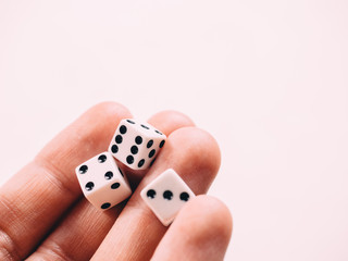 Classic play board game dices in hand. Toning