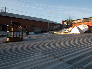 Rooftop of industrial object at the sunset