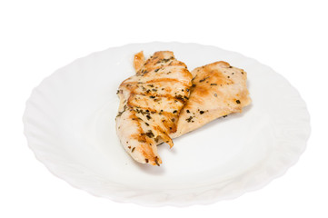 grilled chicken fillet on white plate