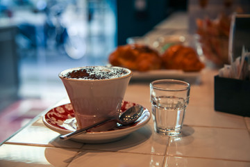 Fresh coffee cup in the morning in city cafe