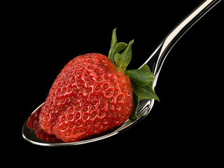 Strawberry in spoon