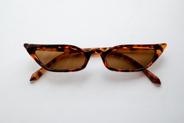 Fashionable sunglasses on a white background trend