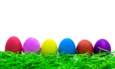 Row of easter eggs isolated on white