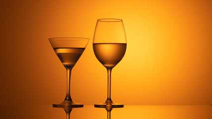wine glasses dishes on a colored background