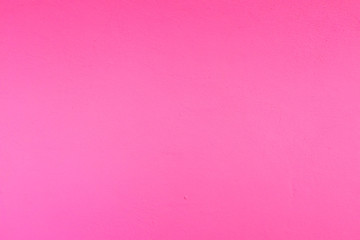 Plastered plastic hot pink wallpaper background texture