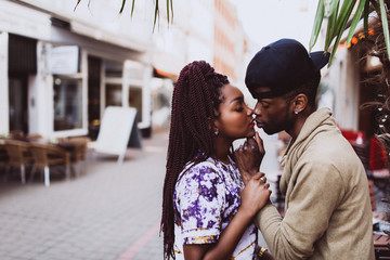 The love story of a guy and a girl on the city streets. Young people travel. Spring walk around the city.