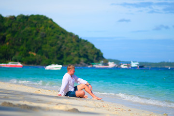 Man sitting on the beach