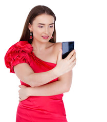 Fototapeta premium Pretty happy brunette woman making selfie on smartphone, isolated on whiteM