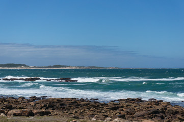 Fototapeta na wymiar Ocean landscape with mild waves and clear sky
