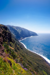View of beautiful mountains and ocean on northern coast near Boaventura, Madeira island, Portugal