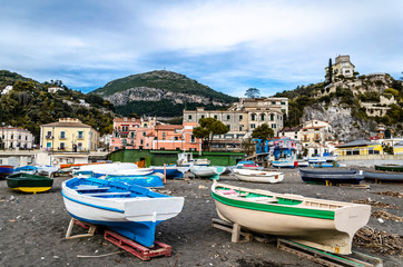 Fototapeta na wymiar boats parked on the sand on an amalfi beach. Italy