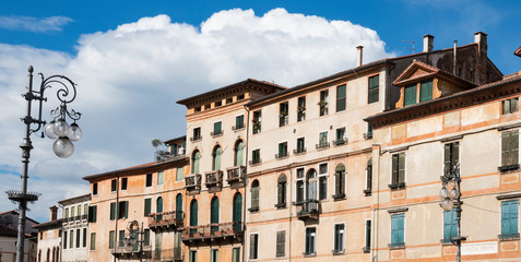 Fototapeta na wymiar panorma of colorful apartments on square Piazza Liberta in Bassano del Grappa, Italy.