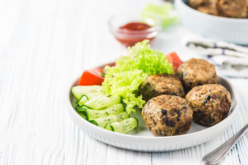 Spicy vegetarian black bean meatballs. Selective focus, space for text.
