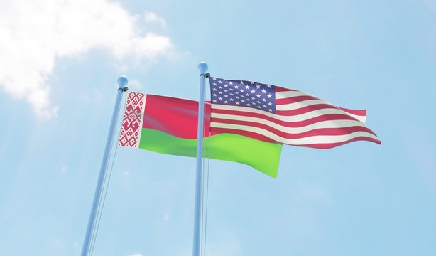 Belarus and USA, two flags waving against blue sky. 3d image