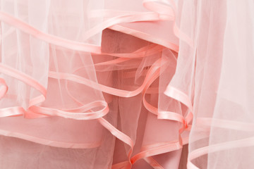 Wedding dress detail. Pink wedding dress frills close up.