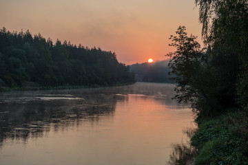 Fototapeta premium colorful sunset on the river