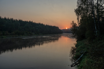Fototapeta na wymiar colorful sunset on the river