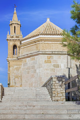 Church of Santa María la Mayor in Estepa, province of Seville. Charming white village in Andalusia. Southern Spain. Picturesque travel destination on Spain.