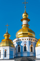 Fototapeta na wymiar St. Michael's Golden Domed Monastery, classic shinny, golden cupolas of the cathedral cupolas of the cathedral, Ukraine, Kiev