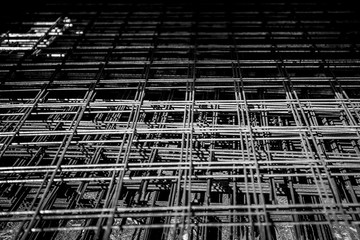 Obraz premium Metal grille for reinforced concrete. Rebar Steel Mesh for Concrete Slab Pour. Close-up.