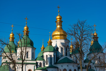 Fototapeta na wymiar Green And Golden Domes Of St. Sophia's Cathedral In Kiev, Ukraine