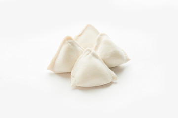 four frozen dumplings on a white background. Isolated Dumplings