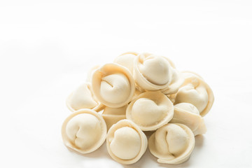 Fototapeta na wymiar heap of frozen dumplings on a white background. Isolated Dumplings