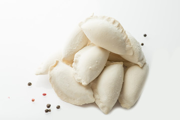 heap of frozen dumplings on a white background. Isolated Dumplings