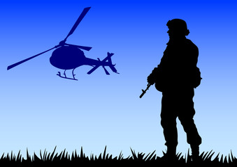 Fototapeta na wymiar Soldier in uniform with weapon and helicopter