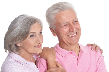 Happy senior couple isolated on white background