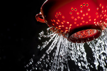 Orange Colander with Water