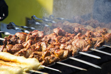 Barbecue meat on grill, traditional street food
