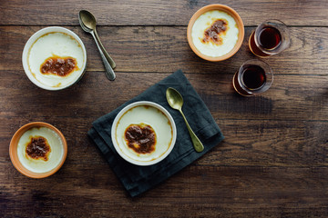 Turkish rice pudding on a wooden table, top view